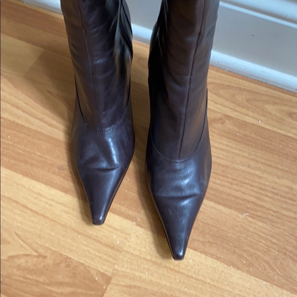 Tall brown heeled boots
